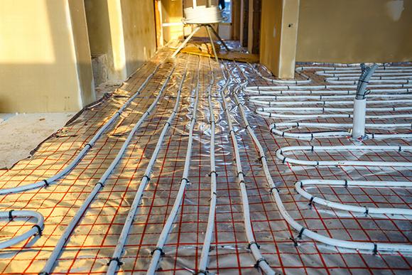 underfloor heating system laid out on floor